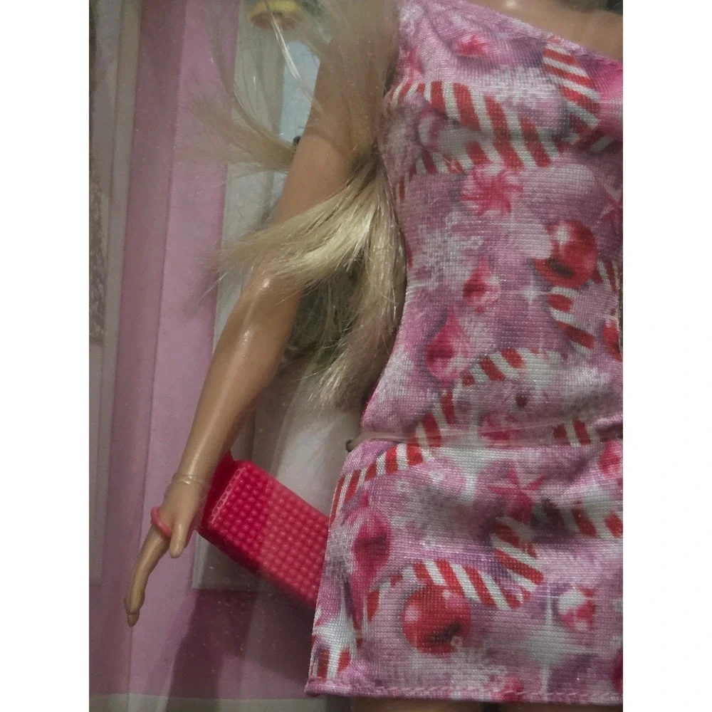 Barbie unwrap magic